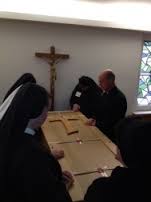 Bishop Kevin Rhoades and Sisters Praying at the Casket of Mother Theresia