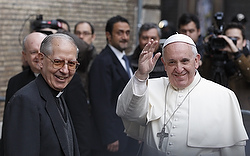 Pope Francis greets crowd as he arrives to celebrate Mass at Church of the Gesu in Rome