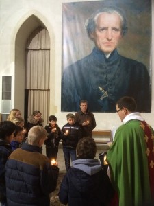 Students from Paris pray at the shrine